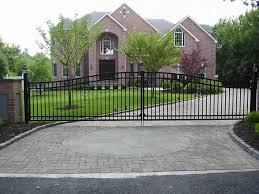 The preferred option when installing fencing or gates into paving or concrete is to use a core drill. Outdoor Aluminum Fences Fence Gates Liberty Fence Railing