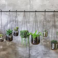 The first step toward creating a lush, beautiful hanging basket is in choosing your plants. 7 Hanging Plant Pots To Give Your Plants A Stylish Edge