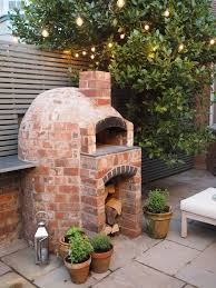 Outdoorkitchen Outdoorkitchenideas Outdoorliving Backyardideas Summer Pizzaoven Pizzaovenwoodfire Dinn In 2020 Pizzaofen Garten Hintergarten Aussenterasse