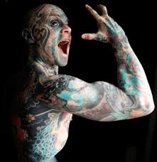 He was 16 when he got his first tattoo and since then he has 12 more inked on his body. Man Covered His Face With Tattoos Rediff Com India News