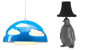 Blue hanging lights in the bedrooms add a personal touch to the space, perhaps capturing a favorite color or adding a note of tranquility. What We Like Lighting