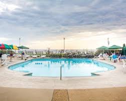 Balcony view with chairs 2020. Quality Inn Suites Oceanfront Hotel In Virginia Beach Va