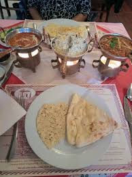 Candlelight dinners with beautiful decorations & options of rooftop, poolside, farmhouse and even private candlelight dinners. Candle Light Dinner With The Some Yummy Indian Curries Picture Of Taj Indian Amsterdam Tripadvisor