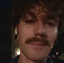 It was never expressed in such a fashion that this was essentially the  American equivalent of the swastika." This man is removing the Confederate  flag tattoo