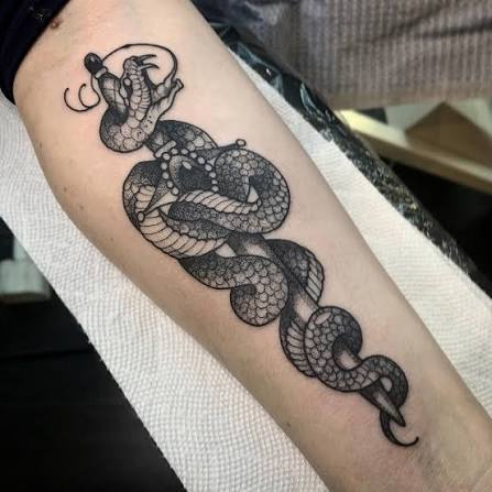 Graham S White • Tattoo • Neotraditional • Kelowna | Snake and Dagger Tattoo Homage for Ashley! Thanks so much for coming in for this cute little guy!! @bosstattoos #kelowna #kelownatattoo... | Instagram
