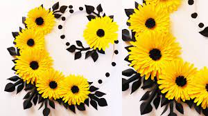 Paper flowers can look almost like the real thing, or they can be as unique as you want. Diy Paper Flower Wall Hanging Easy Wall Decoration Ideas Paper Craft Diy Wall Decor Youtube