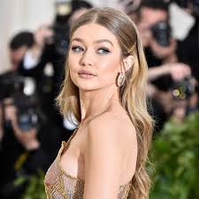 Gigi, 22, showed off her futuristic fashion sense in a glossy pvc coat as she held hands with her beau while en. Gigi Hadid Just Walked Her First Runway Since Becoming A Mom Glamour