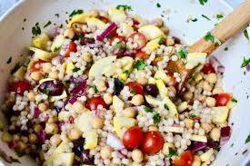 This mediterranean fashion salad is mild, refreshing and overflowing with colourful rounds of thinly sliced uncooked zucchini and yellow pumpkin. Easy Mediterranean Couscous Salad Nuts About Greens
