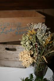 We love how she also. Old Milk Crates Our Dried Flower Arrangements For Our Wedding All Free Dried Flower Arrangements Dried Flowers Flower Arrangements