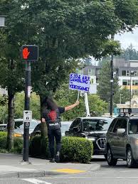 Protester outside Valves Bellevue WA offices : rvalve