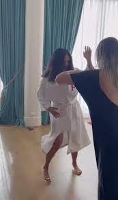 Salma Hayek suffers wardrobe malfunction while dancing in her bathrobe