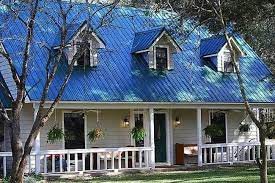 Contrary to common misconceptions, there is a wide range of metal roof colors and finishes, that can beautifully match any house style. Bob Vila Radio Metal Roofs House Exterior Colors Blue Exterior House Colors Metal Roof Houses