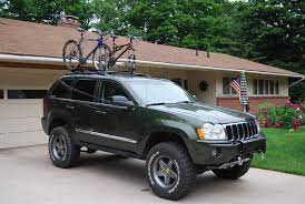 Sold Lifted 2006 Jeep Grand Cherokee 5 7l Hemi Great Lakes 4x4 The Largest Offroad Forum In The Midwest In 2021 2006 Jeep Grand Cherokee Jeep Grand Cherokee Jeep Wk