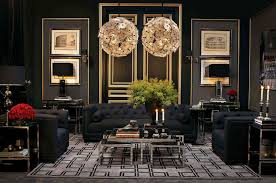 When paired with wooden features, like shelves and a dining table, this scheme seamlessly blends together a modern and classic style. Modern Living Room Black And Gold Novocom Top