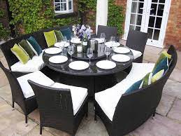 This piece is designed to live outdoors, constructed from resin that won't mind weathering bright uv light or rainstorms. Dining Room Tables 50 Designs Made From Glass Wood Large Round Dining Table Dining Room Table Seats 10 Round Patio Table