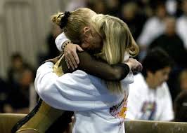 Former Kellam star gymnast leaps into first head coaching job at Penn,  following in her mother's footsteps