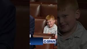 Rep John Rose's son makes silly faces at camera during dad's remarks