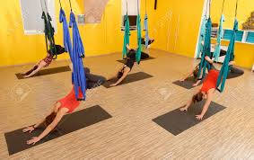 Antigravity yoga is far from traditional forms of yoga. Women Doing Anti Gravity Aerial Yoga Exercise In The Gym Stock Photo Picture And Royalty Free Image Image 35057422