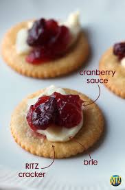 Baked brie with carmelized onions. Use Thanksgiving Leftovers To Make These Cranberry Brie Ritz Toppers Brie Cheese And Cranberry Sauce Are A Great Snack Combination Food Christmas Food Snacks