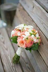 Maybe you would like to learn more about one of these? Pretty Wedding Bouquet With Coral Roses Corals Dahlias White Stephanotis White Ranuncul Elegant Backyard Wedding Bridal Bouquet Coral Coral Bouquet Wedding