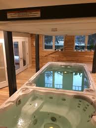 A Beautiful Indoor Swim Spa Install Complete With Automatic Cover From Covana Indoor Swim Spa Indoor Swimming Pools Hot Tub Swim Spa
