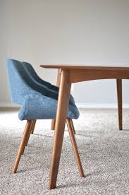 Living The Modern Life World Market Weston Fixed Mid Century Modern Dining Ta Midcentury Modern Dining Table Modern Dining Table Mid Century Modern Interiors