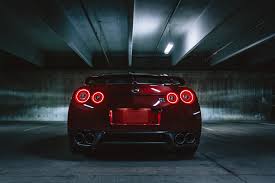 日産・スカイライン, nissan sukairain) is a brand of automobile originally produced by the prince motor company starting in 1957. 5331496 3888x2592 Car Supercar Fast Free Pictures Garage Nissan Gtr Urban Exhaust Shiny Adventure Red Parking Sports Car Parked Taillight Dark Mocah Hd Wallpapers