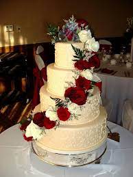 The tapered spatula has a fine point, perfect for making petals and leaves. Ivory Wedding Cake With Red Roses Instead Of White Roses I D Do A Green Accent Wedding Anniversary Cakes Ivory Wedding Cake Wedding Cake Roses