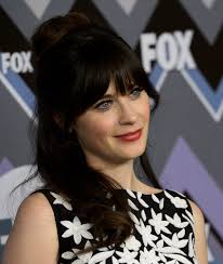 Cute and easy side swept ponytail with knotted decorations and curls braided hairstyle for everyday. Another Cute Half Up Hairstyle Idea To Steal From The Always Adorable Zooey Deschanel Glamour