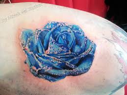 Sizes of blue roses tattoos can be enlarged according to different body parts. Blue Rose Tattoo By Mirek Vel Stotker Stotker Flickr
