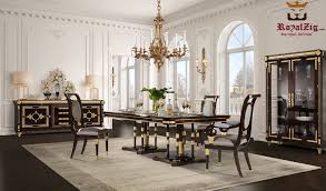 The contemporary dining table, chairs, and chandelier are all from the designer's home. Cairo Luxury Hand Carved Designer Dining Table Royalzig