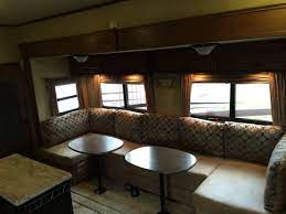 Check out our top 5 travel trailers under $20k on a budget! I Replaced The Dining Table And Sofa Bed With This U Lounge Sectional Swapped From Another Rv Kitchen Remodel Design Rv Remodel Kitchen Remodel