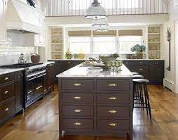 What if you go through all those steps to paint your cabinets and you end up really disliking the color? Dark Brown Kitchen Cabinets Cottage Kitchen Benjamin Moore Navajo White House Beautiful