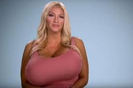 Woman Self-Inflated Her Breast Implants to Weigh 20 Lbs.: 'I Love Being in  Control'