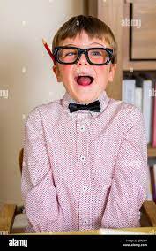 little nerdy boy with geeky goggles, making facial expressions Stock Photo  - Alamy