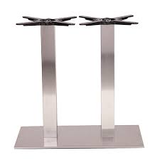 With a curved stainless steel base, a marbleized top. Next Day Danilo Twin Stainless Steel Table Base Dining Height Nobis Restaurant Furniture