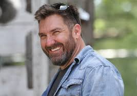 Caption this photo of Mark Bowe and his son