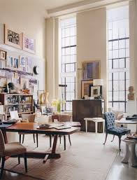 The swing arm lamp and the print reinforce the vintage in. Peek Inside The Offices Of Some Of Interior Design S Most Famous Designers Designed Home College Apartment Decor Interior Design