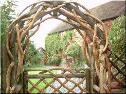 Wooden Fence Made From Branches Natural Industrial Loft F Garden Arches Rustic Gardens Rustic Garden Furniture