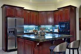 Cherry cabinets with black granite idea for backsplash cherry. 52 Dark Kitchens With Dark Wood Or Black Kitchen Cabinets 2021 Home Stratosphere