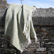 I think the color is more of a rich gold or maybe a mediterranean. Olive Green Wool Blanket Throw Fishbone
