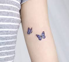 Butterfly Tattoo In 2020 Butterfly Tattoos For Women Purple Tattoos Tattoos