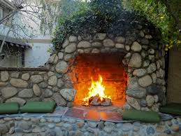 Fire pit chimney, when it's attached to the stone or concrete fire pit reminds an outdoor fireplace, which looks much more interesting and adds completely different character to the patio or backyard. 35 Amazing Outdoor Fireplaces And Fire Pits Diy