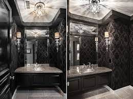 The geometric side table and patterned wallpaper represent the new, while the retro faucets and brass mirror keep their roots in the past. Always On Trend 20 Powder Rooms In Black And White