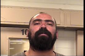 City worker linked to biker gang, arrested for murder