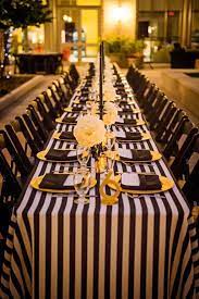Monochrome table decor (great for christmas dinner) with bold flowers to enliven it. Black White And Silver Decorations For A Party Novocom Top