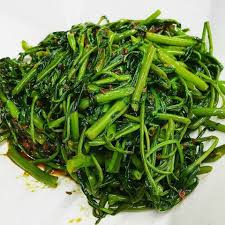Plecing kangkung made from blanched kangkung leaf (ipomoea aquatica) served cold with plecing sambal, made from ground red chili pepper, shallots, garlic, burned bird's eye chili, candlenut, kaffir lime. Kangkong Ano Ang Kang Kong Mali Sa English