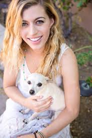 Portrait Of Young Blond Woman With Blond Dog Chihuahua Stock Photo