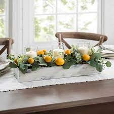 This is an easy spring lemon centerpiece anyone can put together. Lemon And Eucalyptus Candle Centerpiece Kirklands