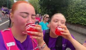 Friends go viral for wine breaks during Women's Mini Marathon